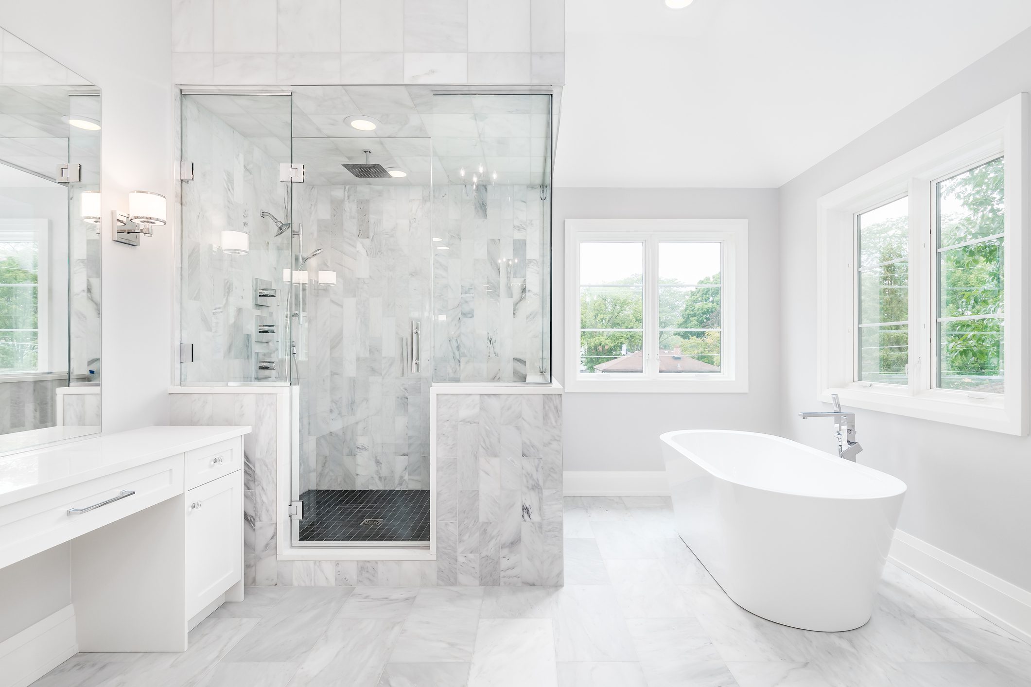 Modern bathroom with shower and bathtub.