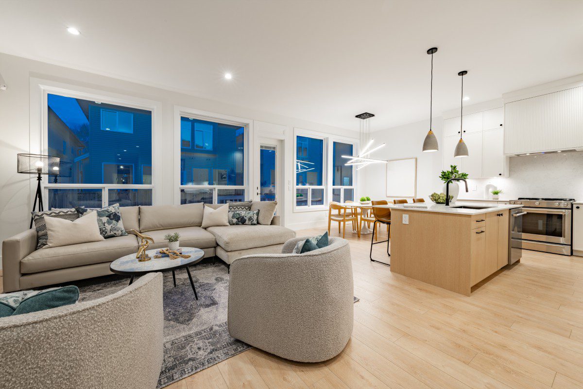 Modern open-concept living room and kitchen.